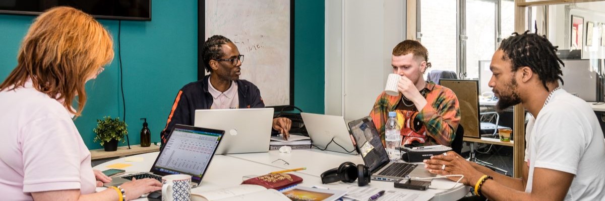 People working collaboratively in a SPACE4 meeting room